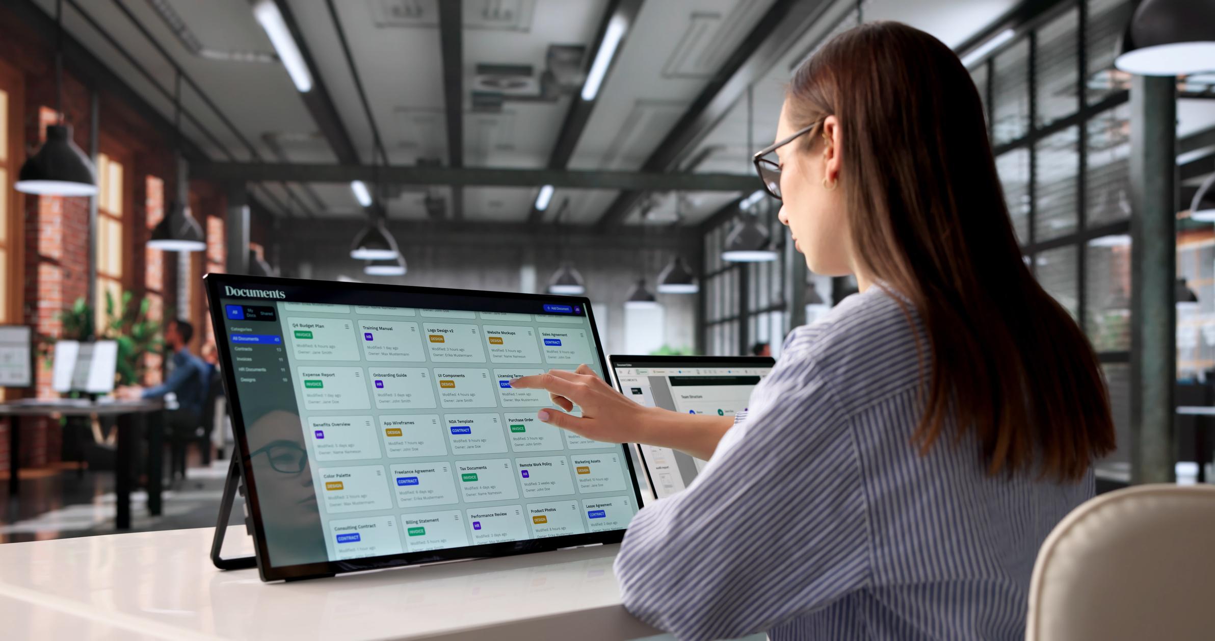 Business professionals managing PDF/A documents for long-term digital archiving
